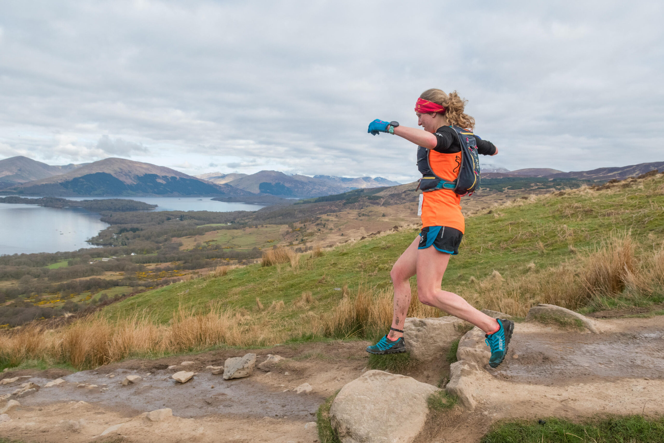 Female trail runner and eventual ladies winner Rachel Normand descending Conic Hill during the Highland Fling ultra marathon race in 2018